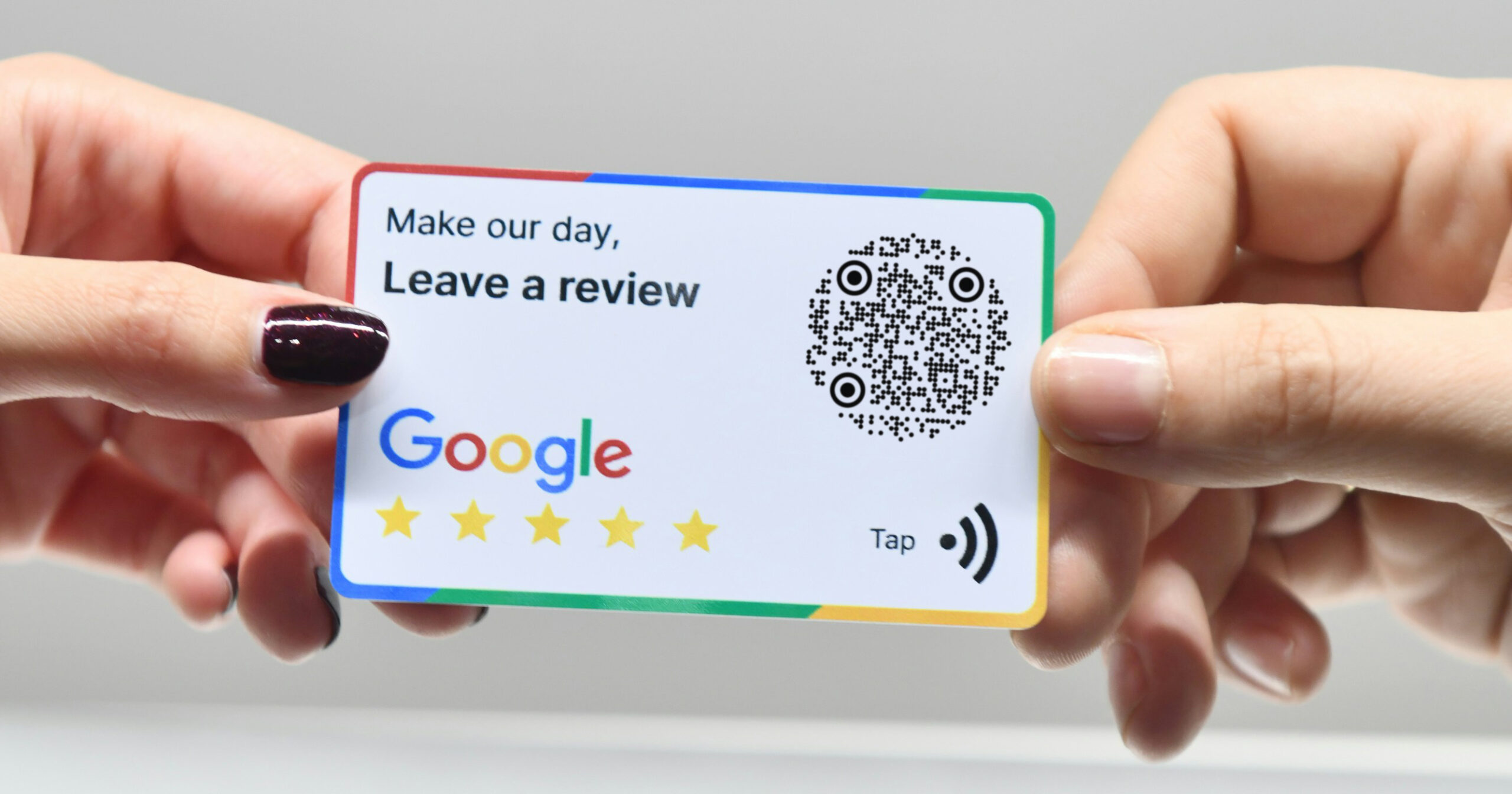 A google review card with both a QR Code and NFC tag.